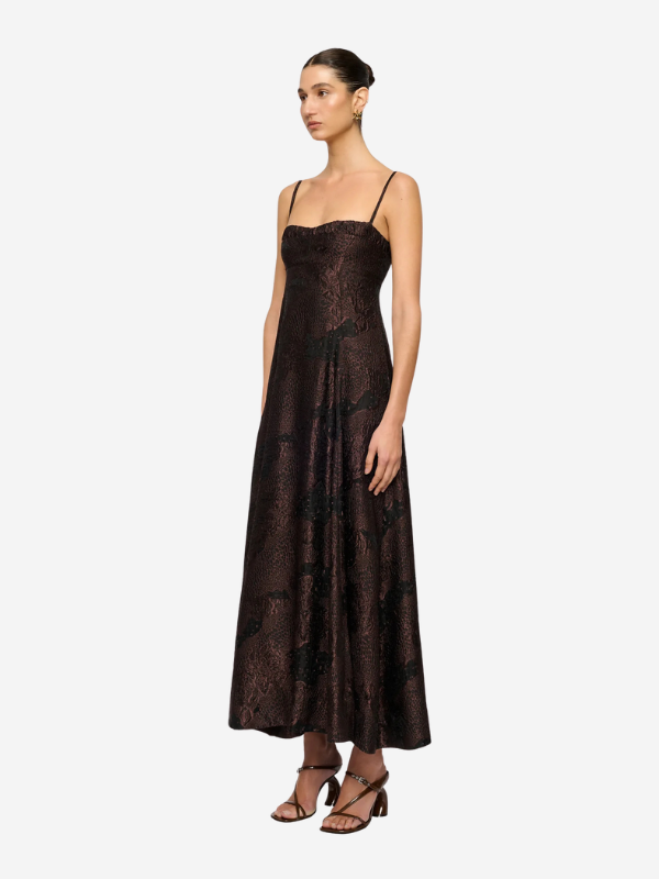 Full view of the Theron Midi Dress in Arabica featuring a flowy midi-length hemline and subtle transparency.