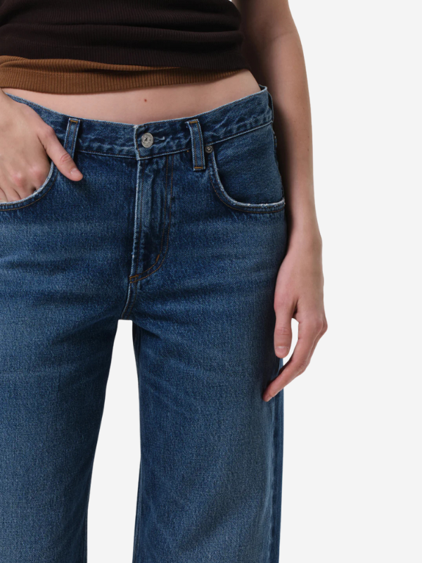 Lifestyle image of Lindz Easy Straight in Chaya paired with a crisp shirt, demonstrating versatile fashion.