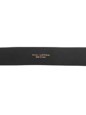 Close-up view of the Avery Belt in Black/Antique Brass showcasing its elegant antique brass finish and contoured shape.