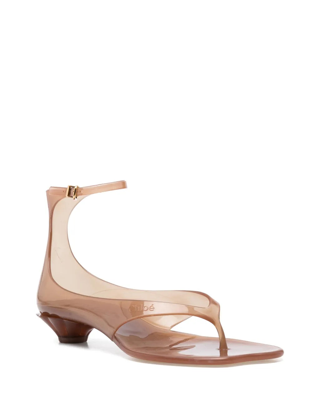 Stylish detail of Chloé Jelly Sandals in Sunny Brown featuring a distinctive shell-shaped heel.
