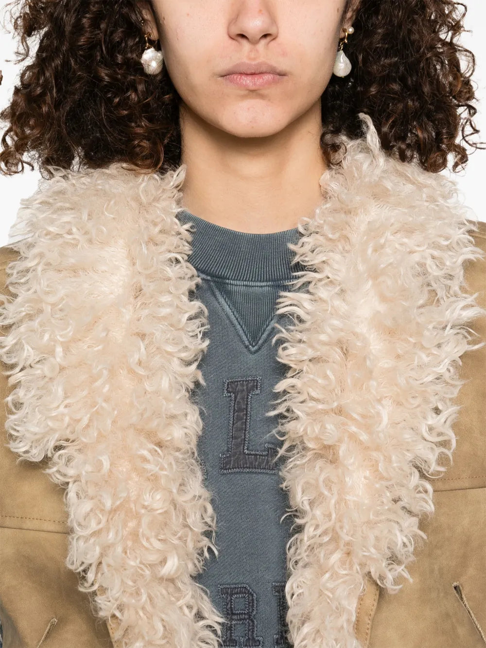 Back view of Clara Vest in Taupe, displaying the clean lines and fashionable fit.
