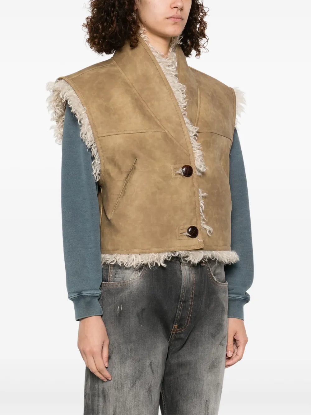 Isabel Marant Clara Vest in Taupe, highlighting its side pockets and reversible style.