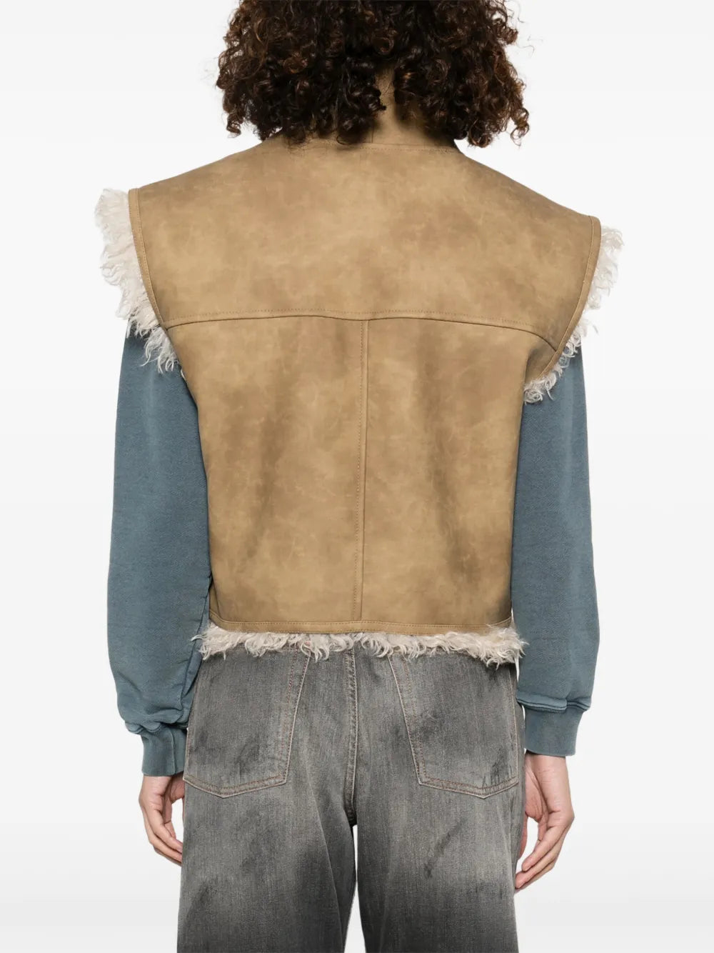 Model wearing Clara Vest in Taupe by Isabel Marant, perfect for layering in casual outfits.