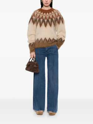 Close-up look at the Natania Sweater in Rust highlighting the luxurious mohair blend and ribbed finishes.
