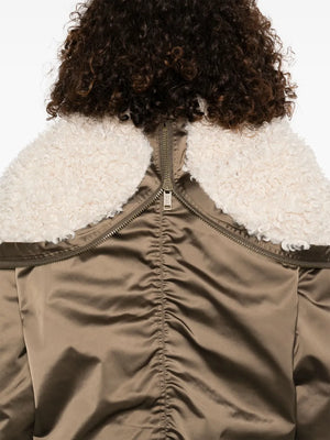 Front view of the Elisa Coat in Khaki by Isabel Marant, showing off the snap-fastened pockets and detailed design.