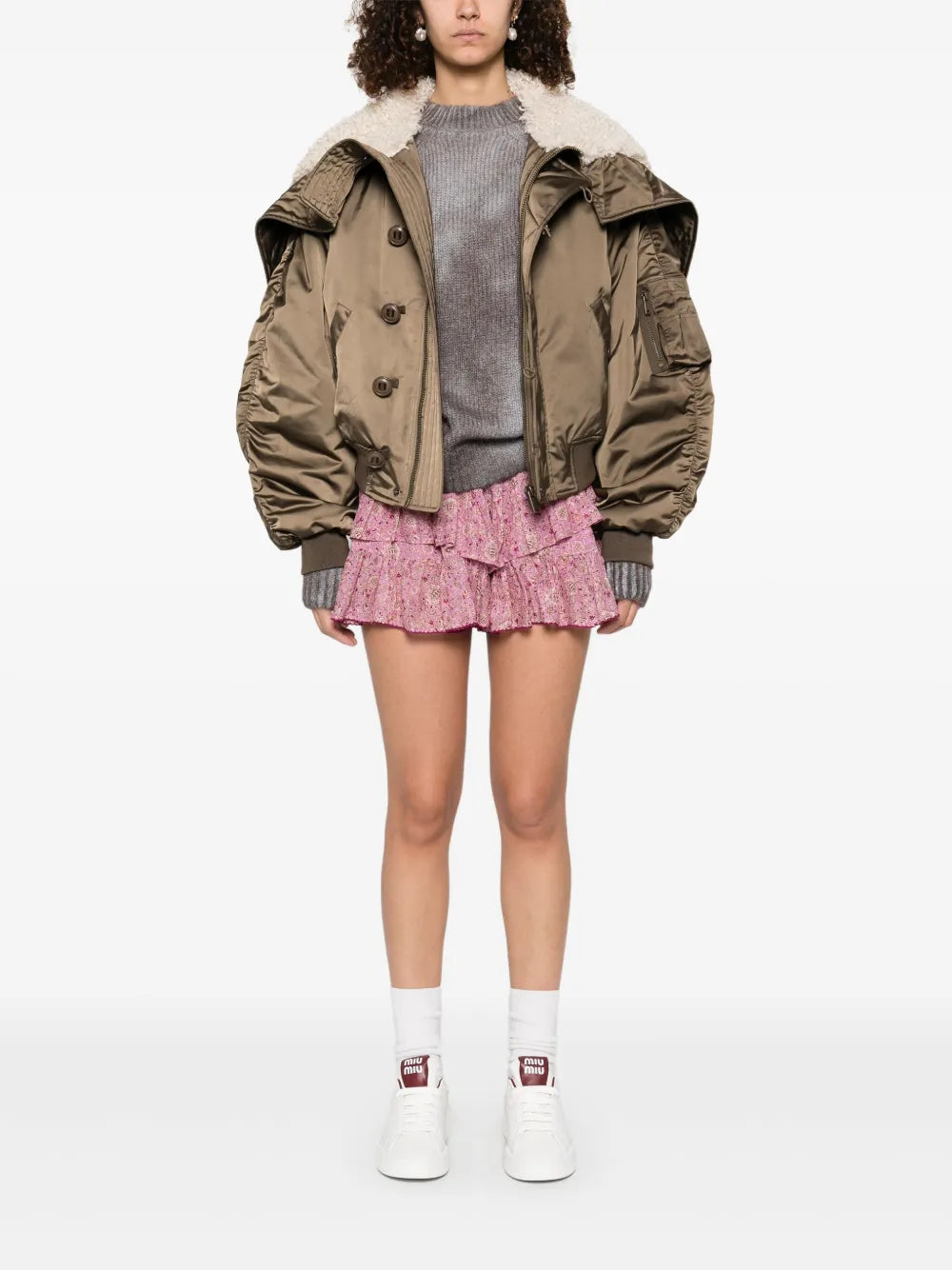 Close-up of the Elisa Coat in Khaki, highlighting the stand-up collar and stylish zippered hood.