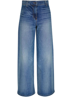 Megan Jean in Classic Wash displayed on a model showcasing the mid-rise cropped wide leg design, made by Nili Lotan.