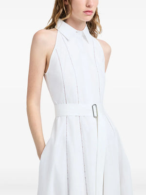 Model wearing the Dorothy Dress in White, demonstrating its comfortable cotton fabric and designer style.