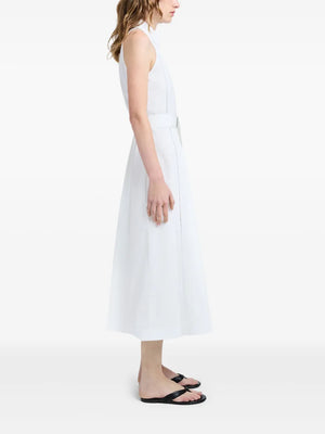 Side view of the Dorothy Dress in White highlighting its sleek silhouette and waist accentuation.