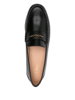Side view of Chloé Loafer in Black with sleek silhouette, made in Italy for a fashionable look and comfortable fit.