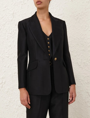 Flat lay of the Hypnotic Tailored Jacket in Black, revealing its luxurious wool and silk blend composition by Zimmermann.