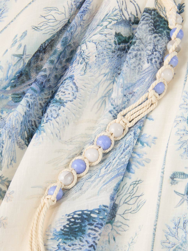 Elegant Wanderlust A-Line Maxi Skirt in Blue Toile styled with accessories, showcasing versatility for both casual and formal wear.