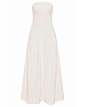 Sculpted Cotton Strapless Dress in Milk showcasing the elegant curved panel lines and full circle skirt.