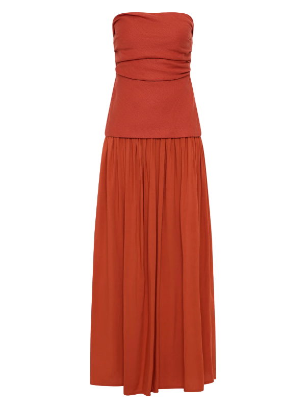 Hedy Maxi Dress in Dusty Tomato by Faithfull, showcasing a fitted bodice with gathered detailing.
