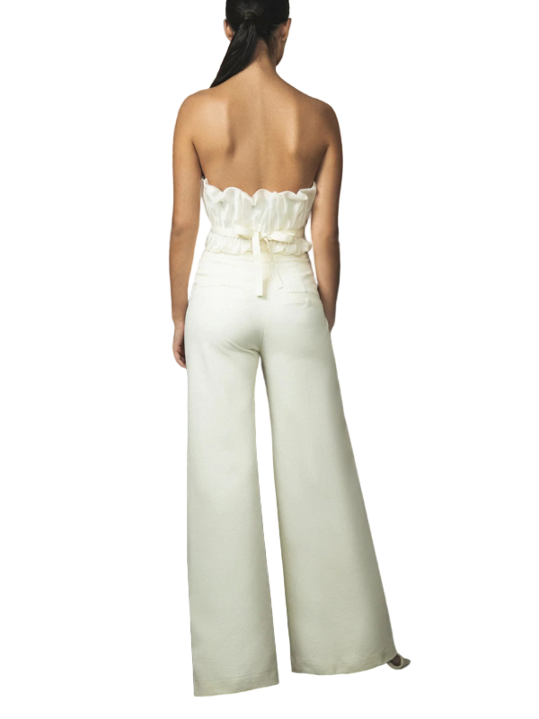 Close-up of the Dedicame pant in Off White featuring hidden zipper and front seam detailing by Andres Otalora.