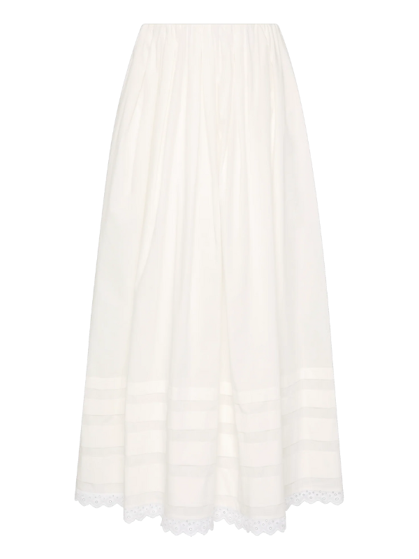 Ruth Skirt in White by FaithFull - front view highlighting the mid-rise design and elastic waistband.