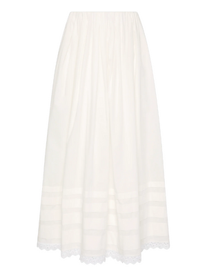 Ruth Skirt in White by FaithFull - front view highlighting the mid-rise design and elastic waistband.