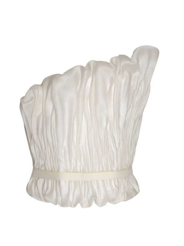 Stylish Auroras in Off White top by Andres Otalora showcasing asymmetrical corset design and delicate draping.