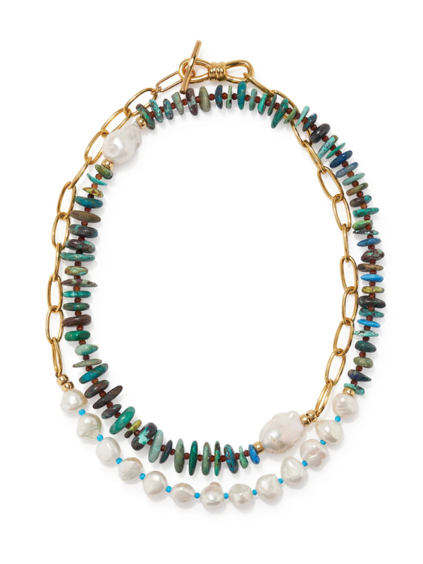 Porto Covo Necklace in Pine featuring a long gold-plated brass chain, freshwater pearls, chrysocolla beads, and hessonite garnet accents.