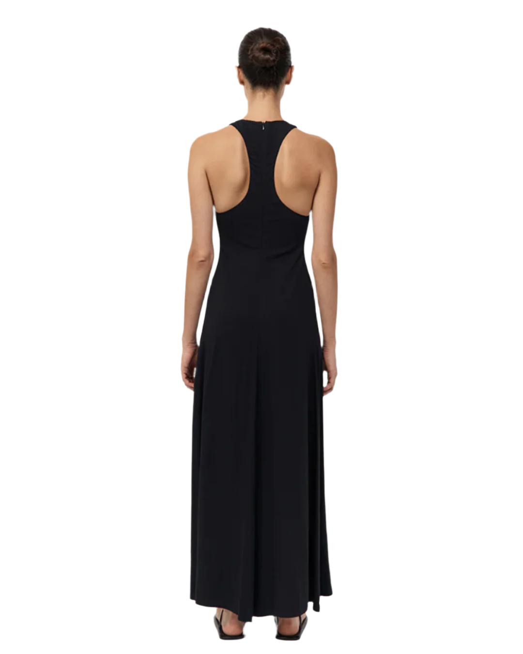 Side view of the Cut Away Maxi Dress in Black, highlighting the flattering curved panel lines and full circle skirt.