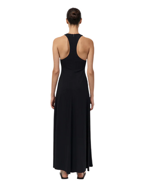 Side view of the Cut Away Maxi Dress in Black, highlighting the flattering curved panel lines and full circle skirt.