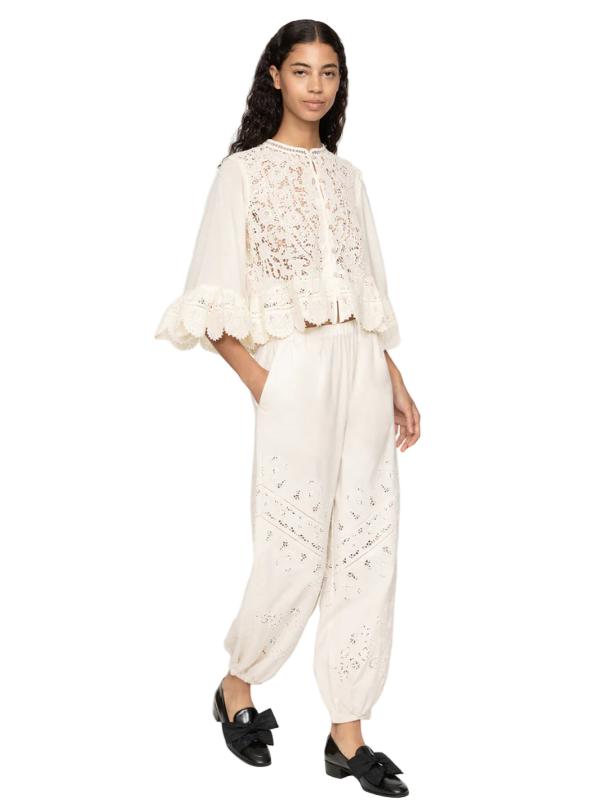 Shanna Lace Track Pants in Cream showcasing intricate lace detailing and a comfortable elasticized waistband.
