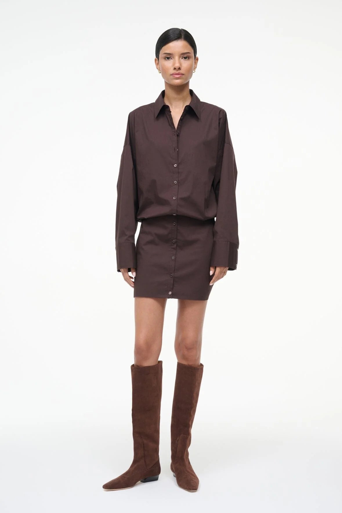 Close-up view of the Cynthia Dress in Earth by Staud, showcasing the button-down details and luxurious cotton poplin fabric.