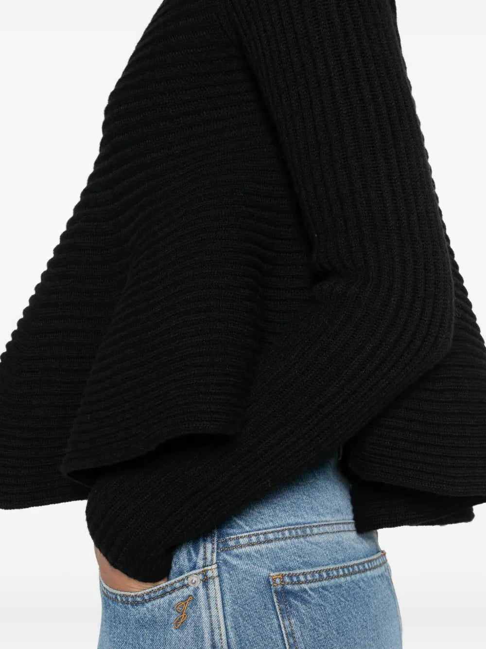 Astice Sweater in Black by Sportmax displayed on a hanger showcasing its elegant flared shape and craftsmanship