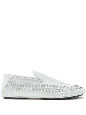 Proenza Schouler Whip Loafer in Ecru showcasing intricate weave stitching detail on soft leather.
