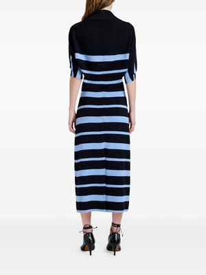 Model wearing the Solana Dress in Black Multi by Proenza Schouler, demonstrating the stylish fit and sophisticated look.