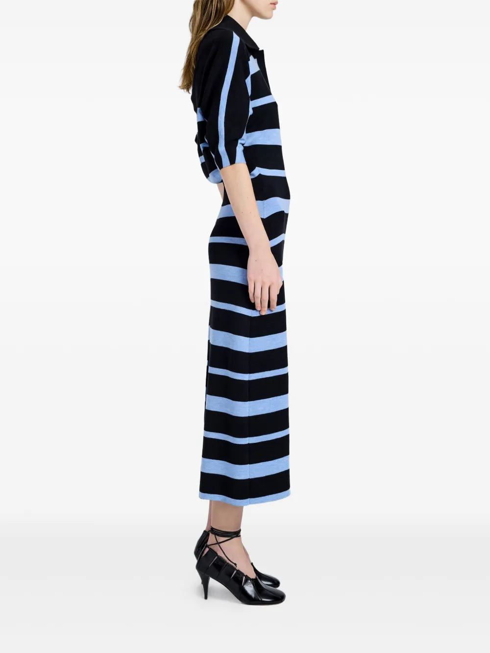 Back view of Proenza Schouler's Solana Dress in Black Multi, illustrating the soft draping and center back slit feature.