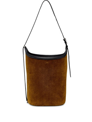 Elegant Brant Bucket Bag in Fern by Proenza Schouler, displayed outdoors.