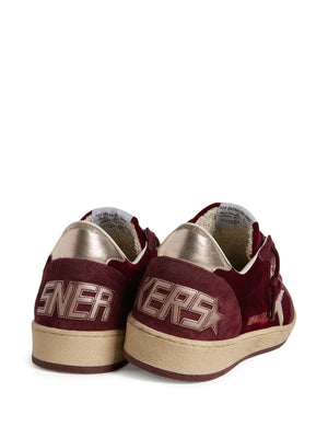 Close-up of the Golden Goose Ball Star sneaker in burgundy velvet with luxury detailing.
