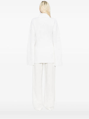 Women’s turtleneck sweater featuring Slit Sleeve Knit in Ecru from TOTEME, crafted in 100% wool for a cozy feel.