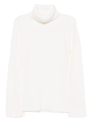 Slit Sleeve Knit in Ecru - a stylish turtleneck sweater women designed by TOTEME featuring high sleeve slits for enhanced movement.