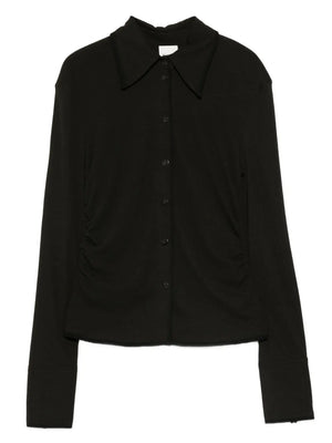 Nanushka Idana Shirt in Black - front view showcasing the smooth mesh jersey fabric with sculpting fit and anthracite binding.