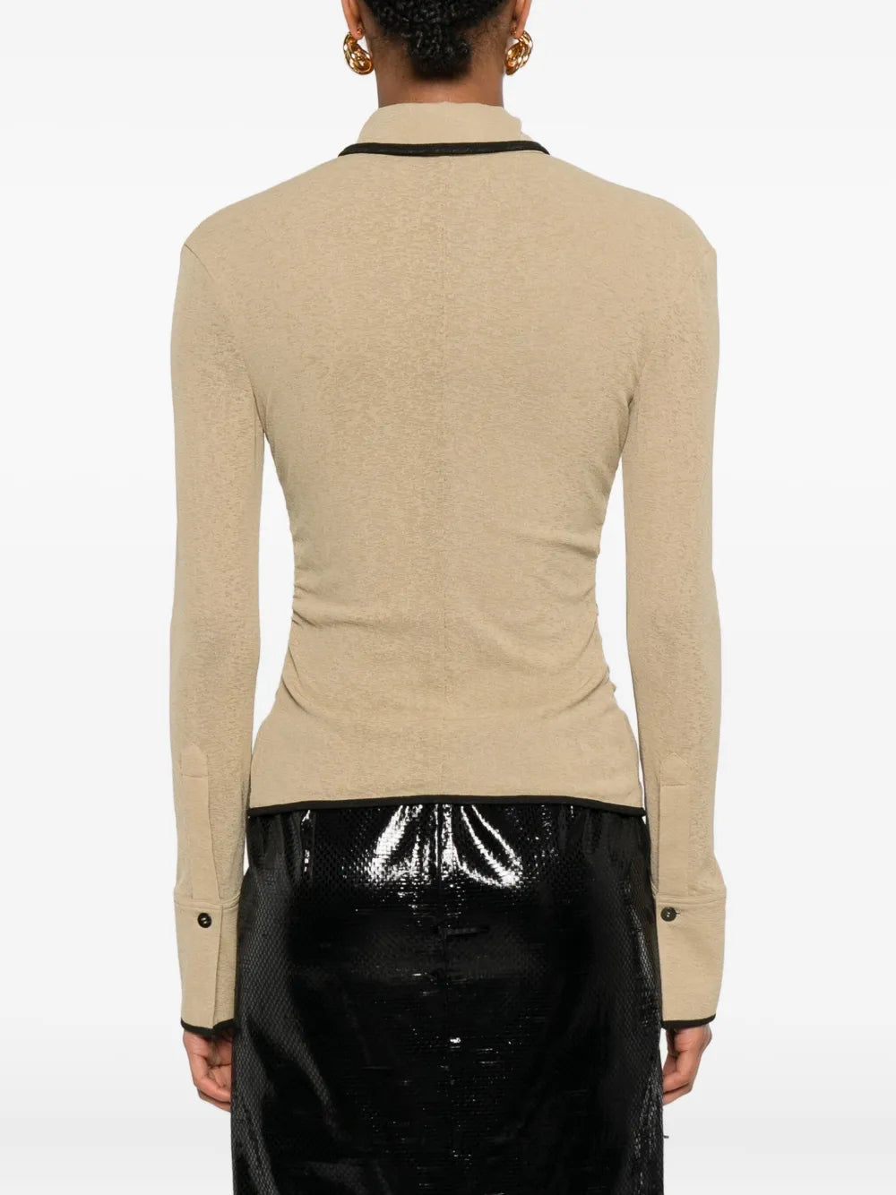 Back view of the Nanushka Idana Shirt in Sand, emphasizing its elegant design and fit.