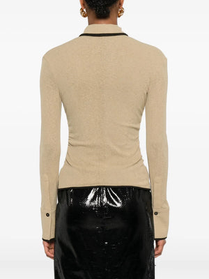 Back view of the Nanushka Idana Shirt in Sand, emphasizing its elegant design and fit.