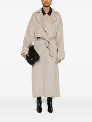 Close-up of the Salima Coat in Stone, highlighting the luxurious 90% wool and 10% silk composition.