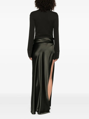 Model wearing the Scylla Dress in Dark Green, emphasizing its comfort and stylish design.