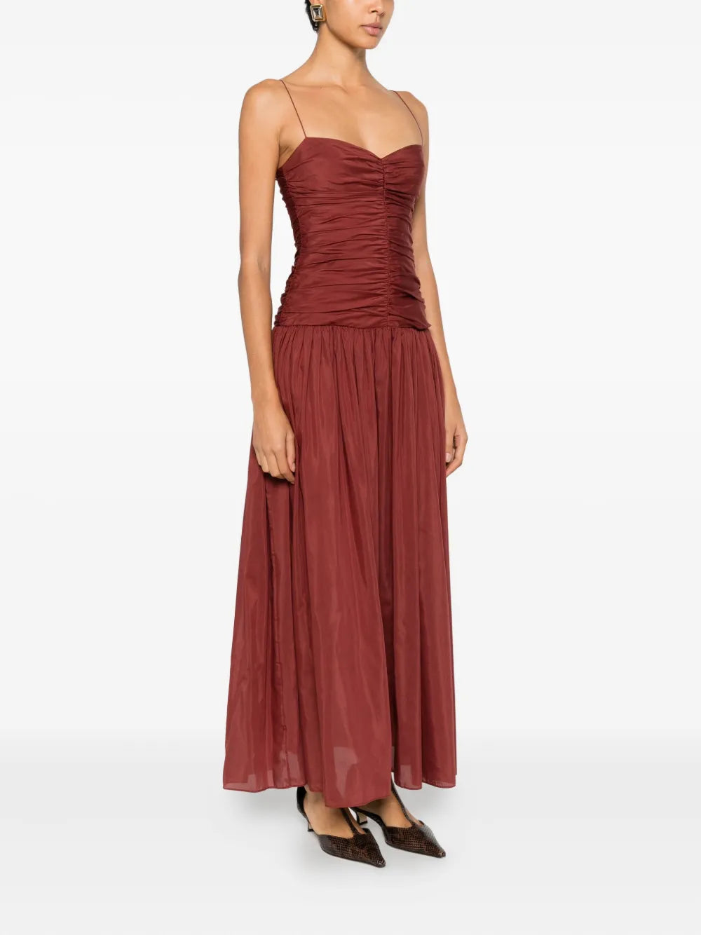 Side view of the Gathered Drop Waist Dress in Maroc, showcasing its low waist design and elegant silhouette.