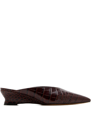 Victoria Micro Wedge Mule in Brown showcasing the croc embossed calf leather design and pointy toe.