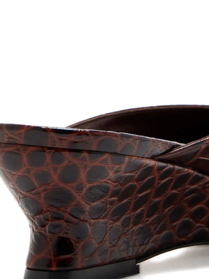 Victoria Micro Wedge Mule in Brown displayed on a stylish background, perfect for any casual outing.