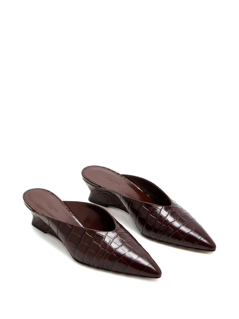 Close-up view of the Victoria Micro Wedge Mule in Brown highlighting the cushioned calf leather insole.
