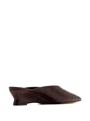 Side view of the Victoria Micro Wedge Mule in Brown demonstrating the elegant 40mm heel.