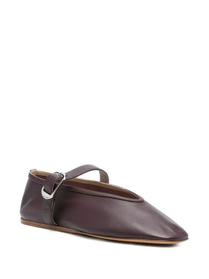 Close-up view of Le Monde Béryl's Stella Slipper in Plum, highlighting the cushioned calf leather insole and leather piping.