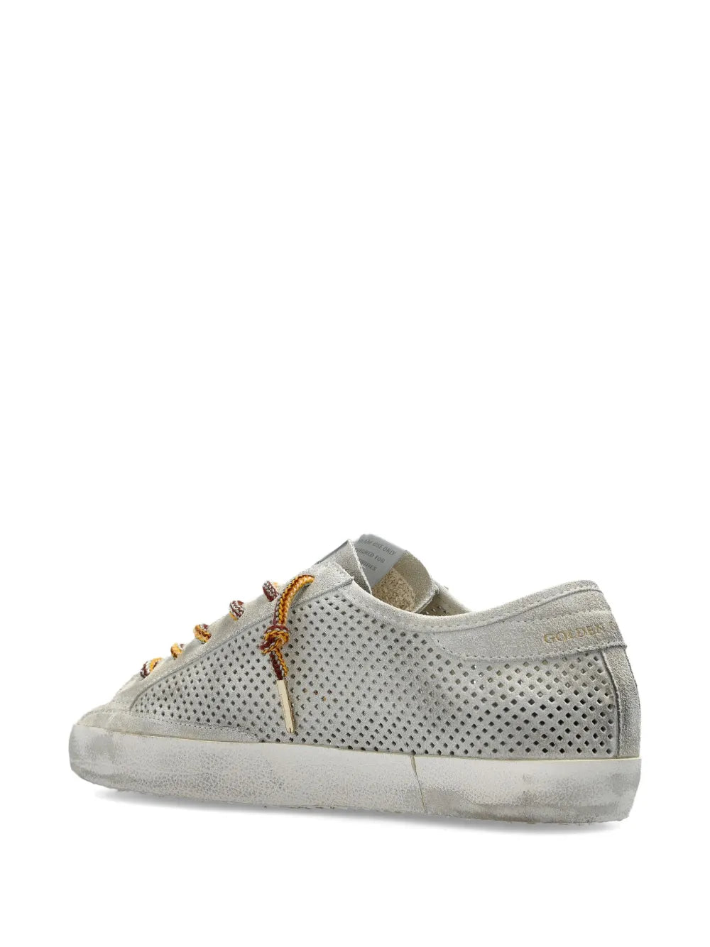 Side view of the Grey Perforated Super Star sneakers highlighting the chic silhouette and luxe materials.