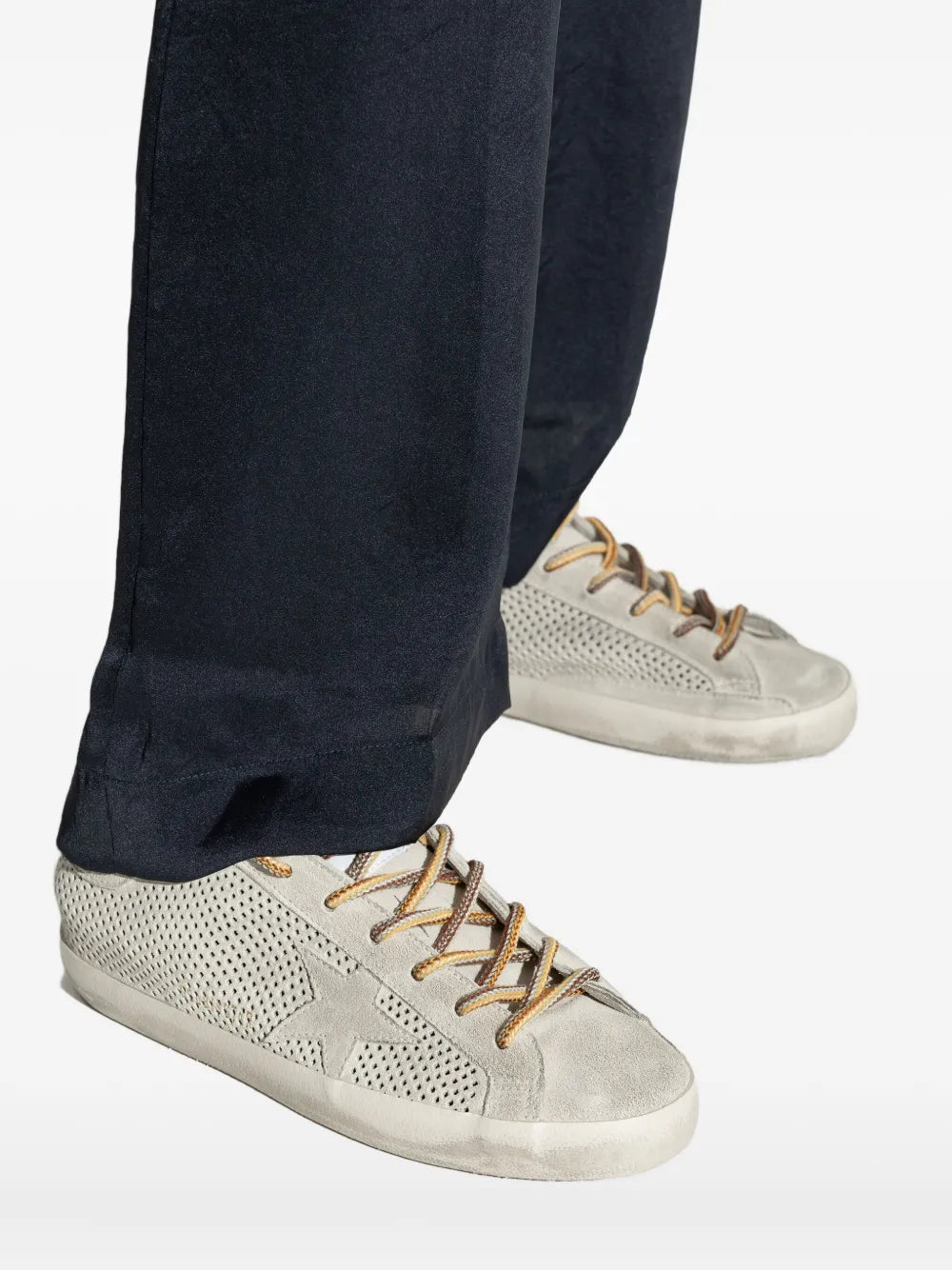 Stylish outfit featuring Grey Perforated Super Star sneakers by Golden Goose Deluxe Brand, perfect for fashion enthusiasts.