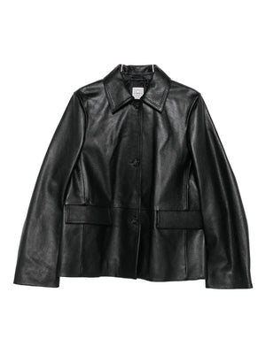 Grained Leather Jacket in Black by TOTEME showcasing heavy grained leather and a straight silhouette for an effortless fit.
