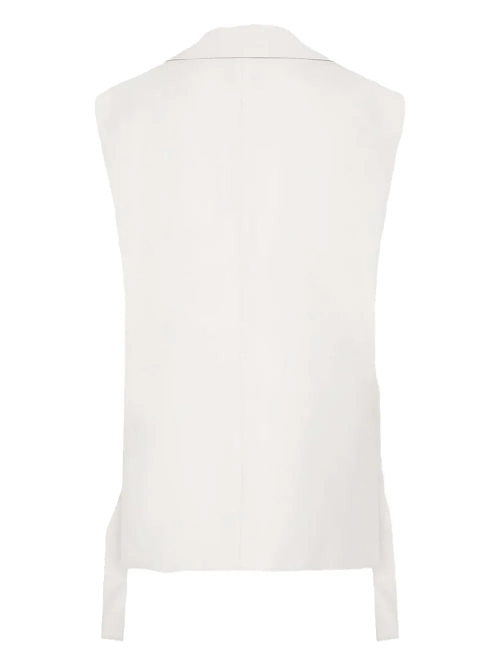 Stylish display of the Relaxed Side Tie Vest in Off White paired with tailored bottoms, demonstrating versatile fashion choices.
